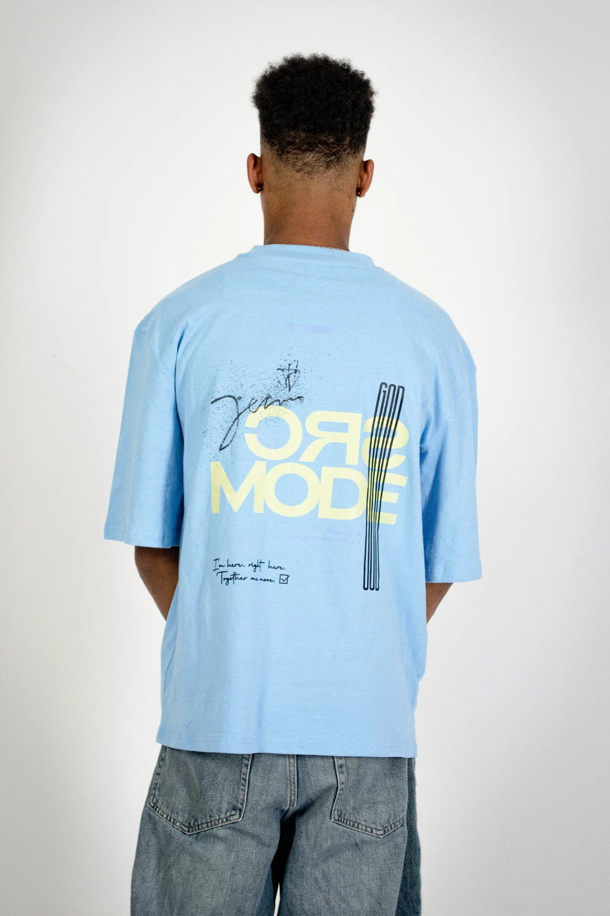 Back view of the Fearless Summer SRC-Mode Shirt in Baltic Blue on a model