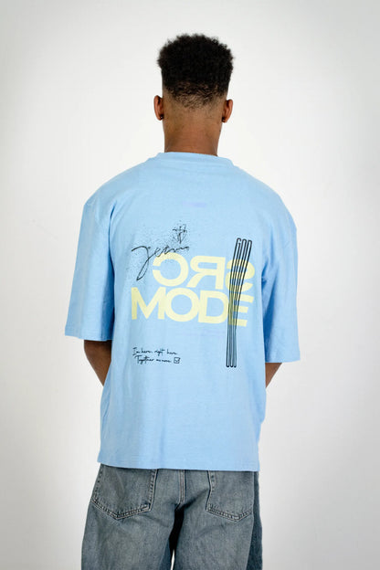 Back view of the Fearless Summer SRC-Mode Shirt in Baltic Blue on a model