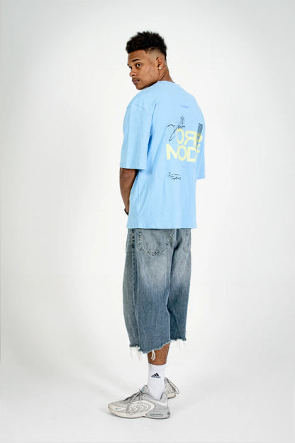 Side view: model wearing the Fearless Summer SRC-Mode Shirt in Baltic Blue – Christian streetwear by Source Mode