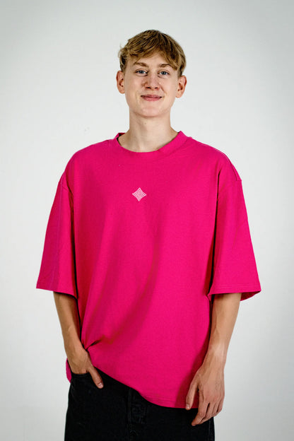 Front view: model wearing the Fearless Summer SRC-Mode Shirt in Hibiscus Pink with GOD Spark embroidery