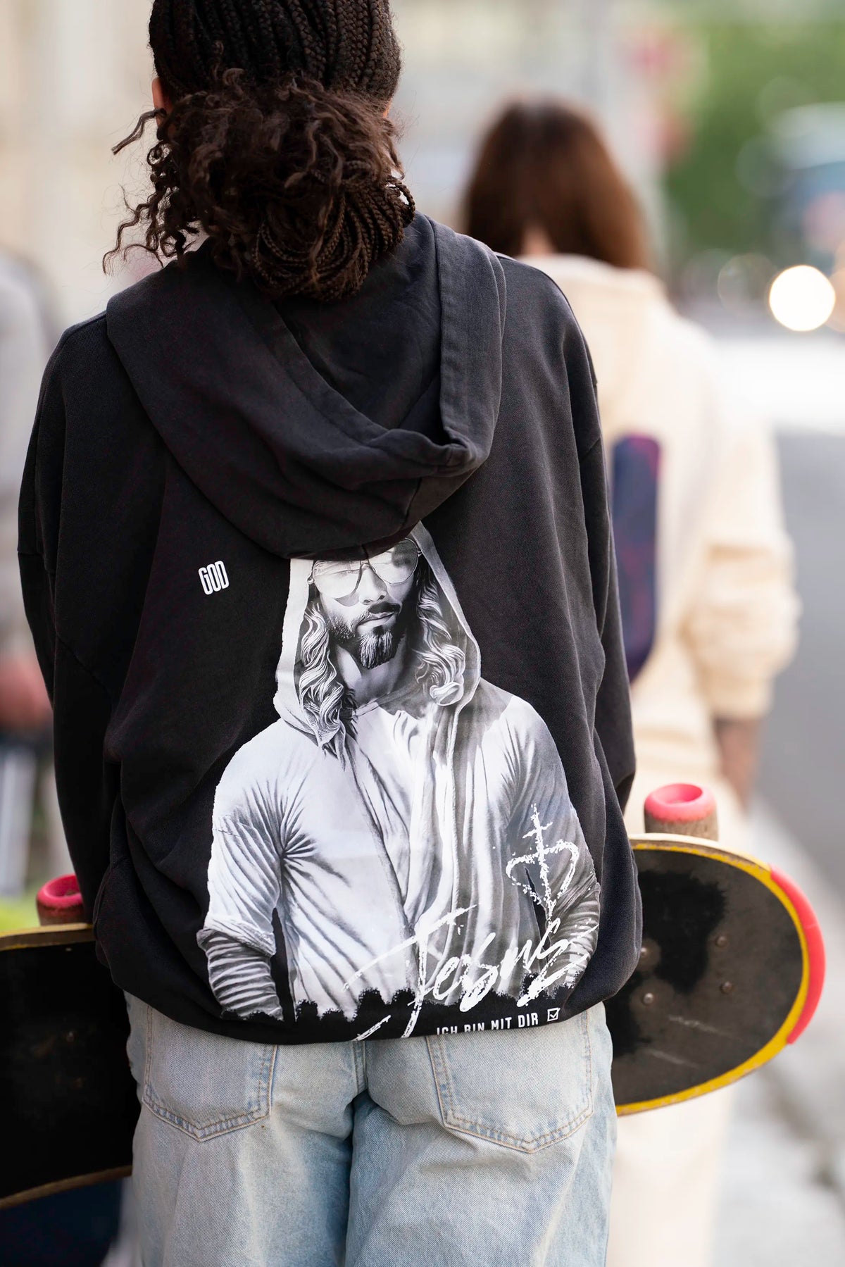 Lifestyle: Open Source Jesus Presence Hoodie in Washed Black with Jesus back print and skateboard