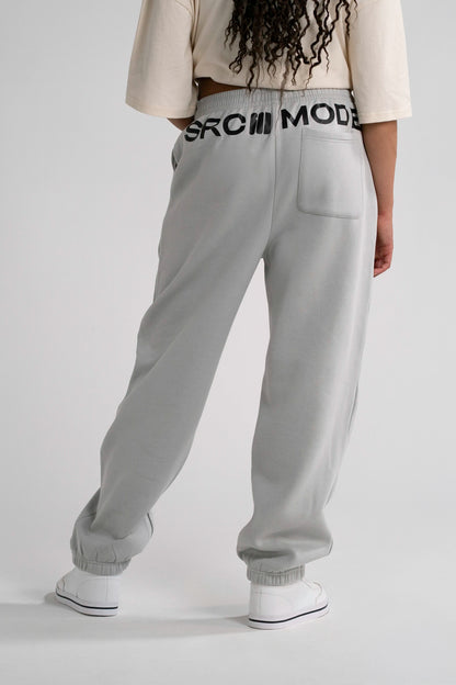 Back view: Open Source Signal Cozy Pants in Light Asphalt with SRCMODE waistband print