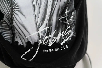 Detail: Jesus Signature print on the Open Source Jesus Presence Hoodie in Washed Black