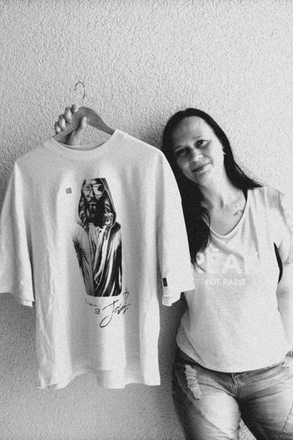 Open Source Christ-before-Me Boxy Shirt in Natural Raw on a hanger – front view with Jesus print